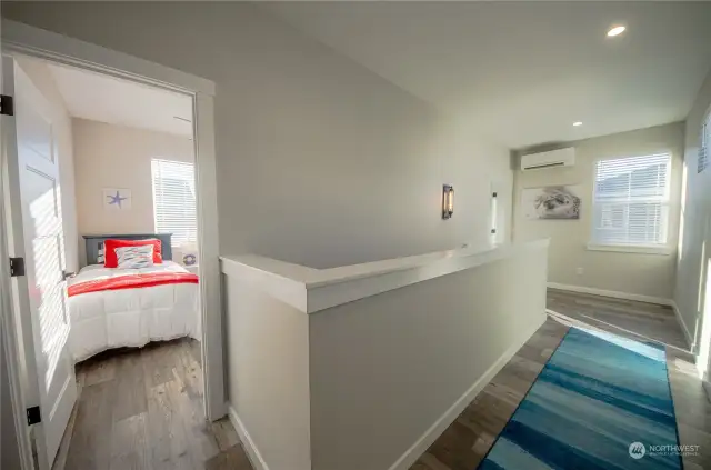 Home features laminate flooring throughout the whole house except stairs and upstairs bathrooms. Easy-care laminate flooring is great for a vacation rental as it is easier to clean and maintain, especially in a pet-friendly unit.   Only the stairs at Seal Pup Cottage feature carpet.