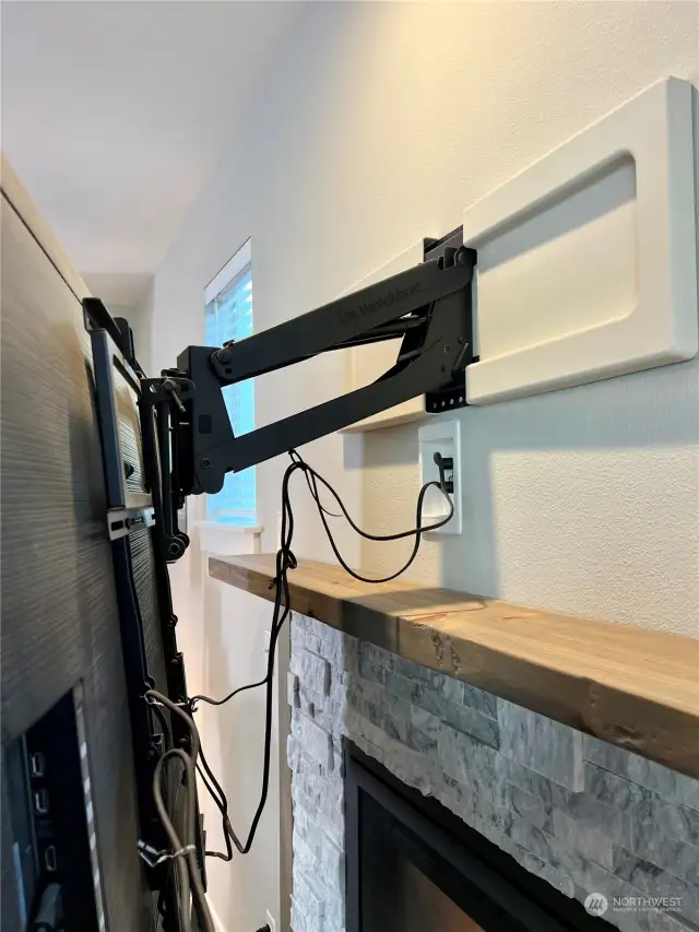 Detail showing the living room TV wall mount.