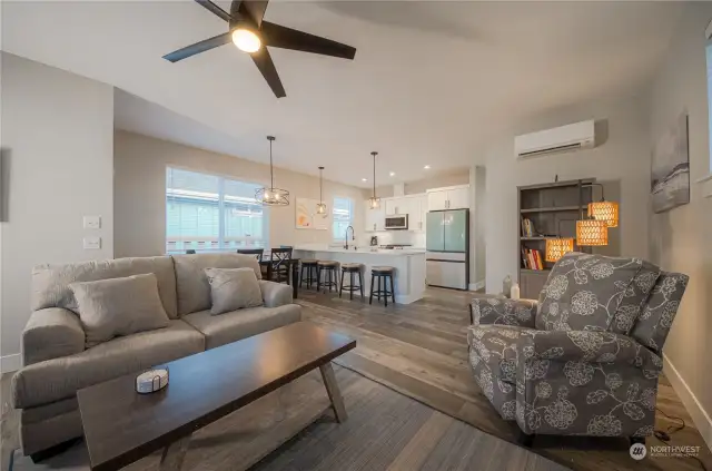 The very inviting seating arrangement in the living area includes a queen-sized sleeper sofa (not visible in this photo) with a matching loveseat plus a big comfy recliner chair.