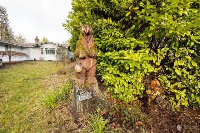 Carved Bear Welcomes You to 10621 110th St SW