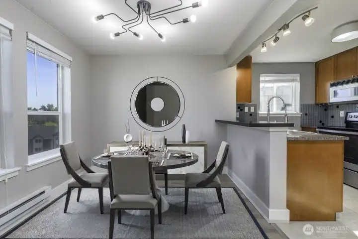 Dining room with views from the window. Virtually staged.