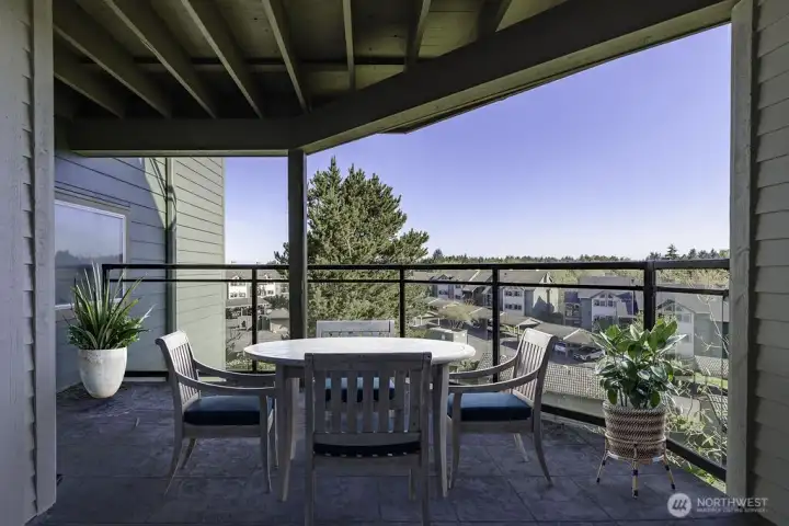 Spacious patio deck off the living room. Virtually staged.
