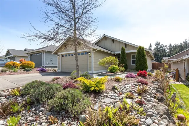 The low maintenance landscaping is sure to please.