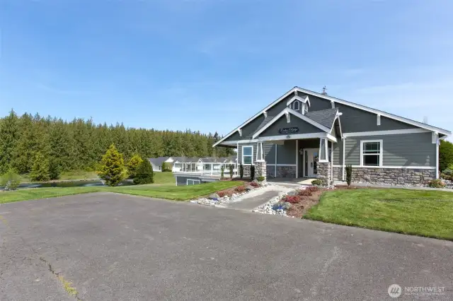 Cedar Ridge clubhouse with a fireside room with full kitchen, fitness equipment, Wi-Fi internet, meeting rooms, and a large deck overlooking the Cedar Ridge pond.