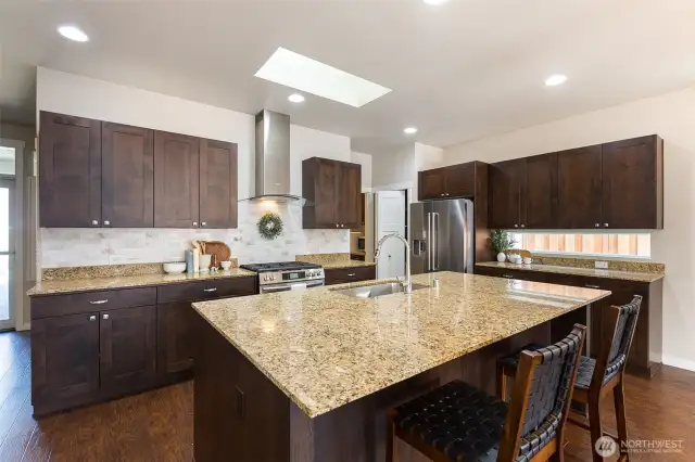 Large island for gathering in the stunning kitchen!