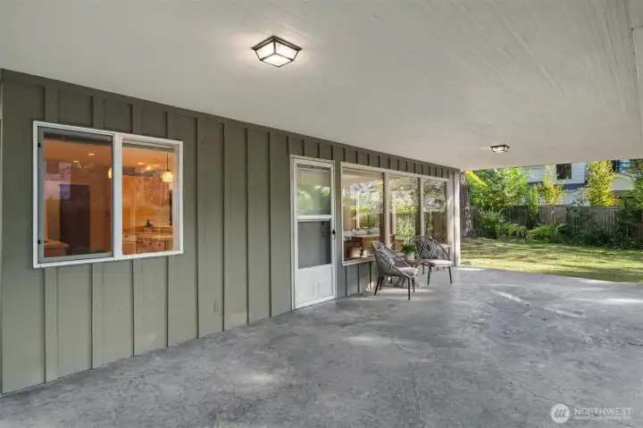 Large covered porch on west side of the home