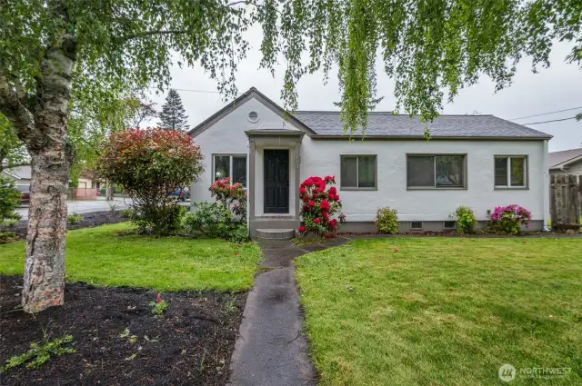 This charming beauty is located on corner of Racine & E Maryland