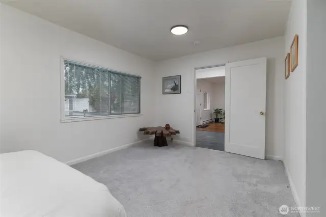 Another view of primary bedroom
