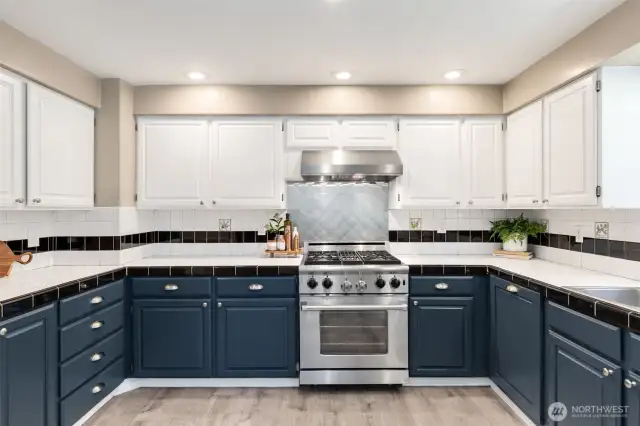 A very functional layout with plenty of room for multiple cooks. Tons of counter and cabinet space here!  the cabinets were just freshly professionally painted.