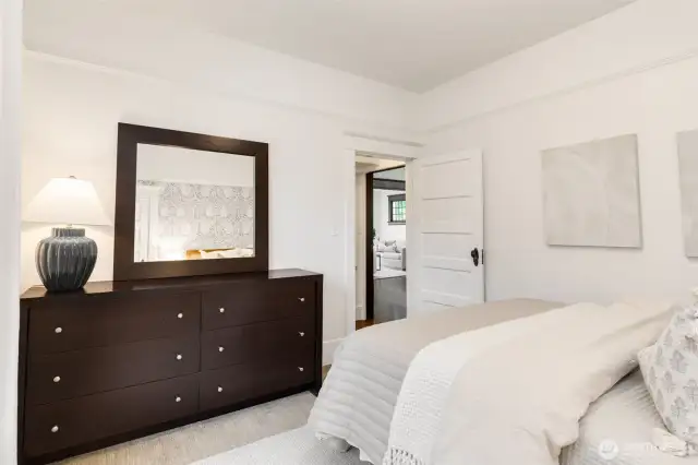 There is plenty of space in this bedroom for a very large dresser and this is a Queen bed.