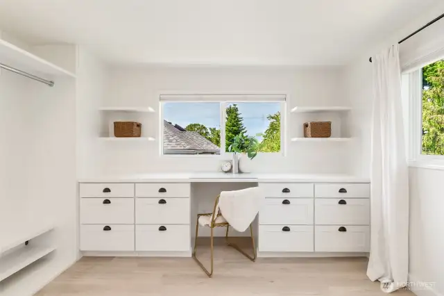 Just off the main bedroom in the Primary is this dressing room with tons of built ins and storage!