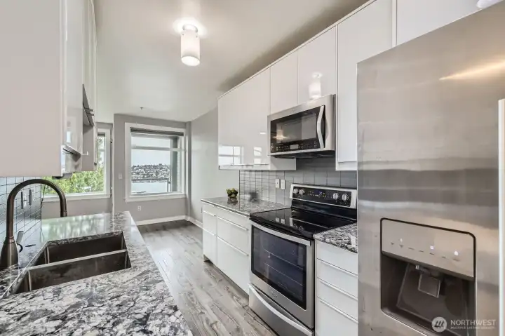 Kitchen; Quartz countertops and stainless appliances