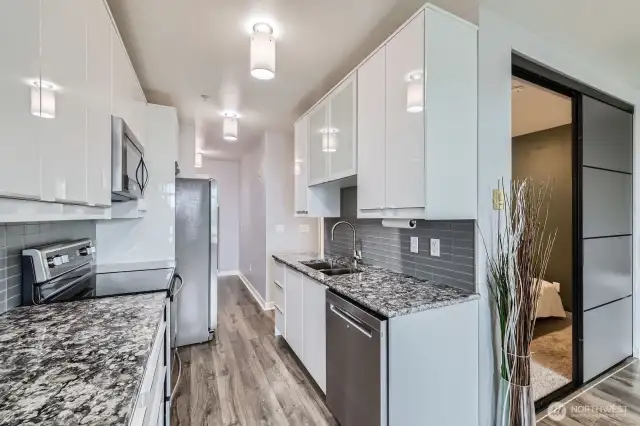 Kitchen; Quartz countertops and stainless appliances