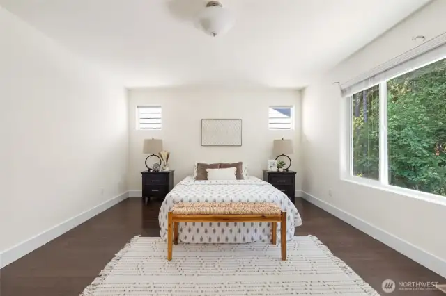 Primary bedroom faces to backyard and greenbelt for lots of privacy
