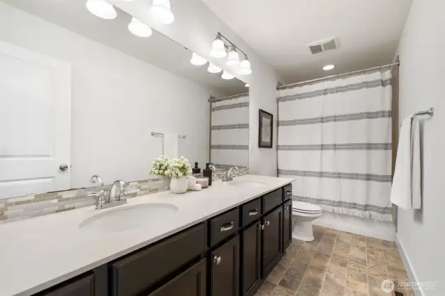 Upstairs bathroom with two sinks!