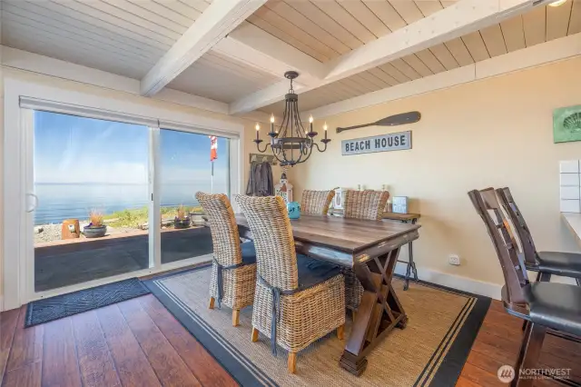 Dining room opens to kitchen and living areas.