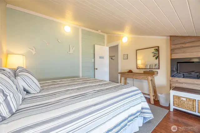 Primary bedroom w/fireplace.