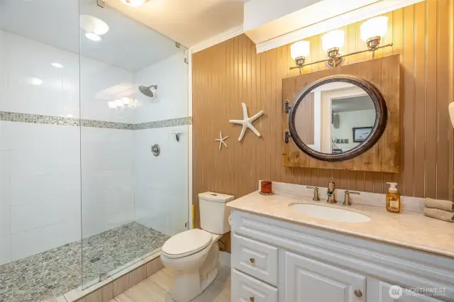 Beautifully remodeled 3/4 bathroom off recreation room/bar.