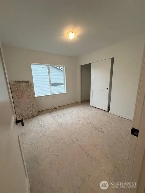 Bedroom 2 located upstairs. Home as of 8/15/25