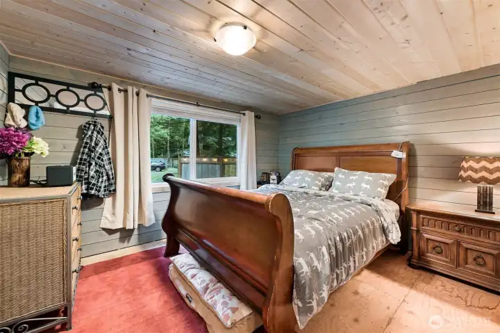 Downstairs bedroom with queen bed