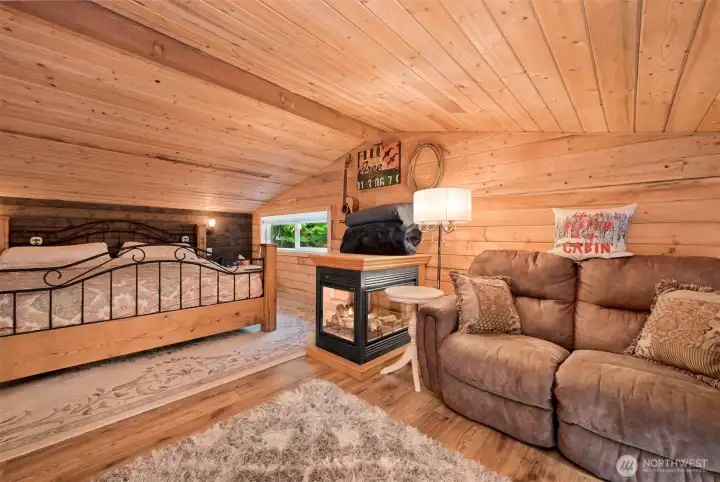 Primary Suite with king bed and sitting area.