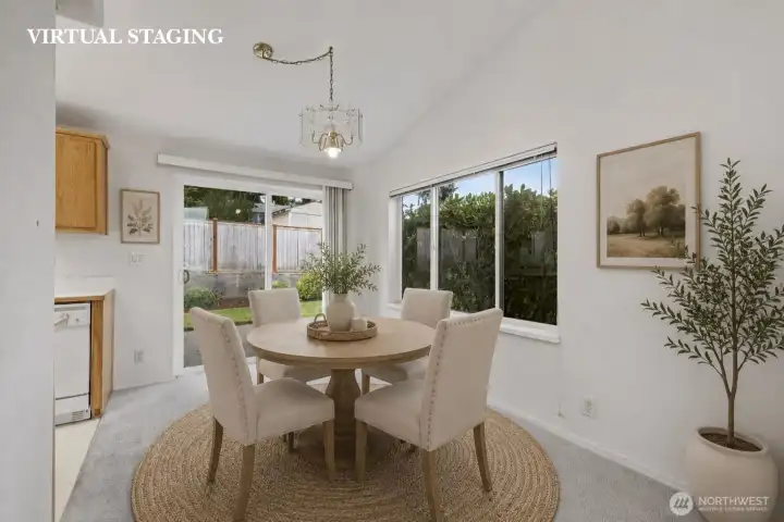 VIRTUAL STAGING: Just off the kitchen, the dining area offers a comfortable space for everyday meals, morning coffee, or gathering with friends and family. The open layout creates an easy flow between the kitchen and living spaces, making the home feel both functional and inviting. VIRTUAL STAGING: Just off the kitchen, the dining area offers a comfortable space for everyday meals, morning coffee, or gathering with friends and family. The open layout creates an easy flow between the kitchen and living spaces, making the home feel both functional and inviting.
