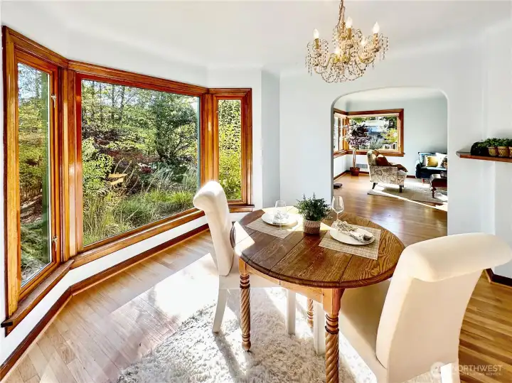 The dining room south facing bay windows offer a lovely view of the gardens for your dining delights throughout the seasons.