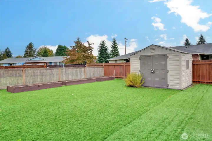Easy maintenance grounds and great shed to store your garden tools.