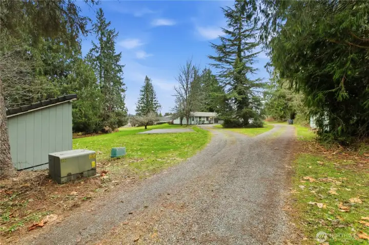 Located on dead end road with circular driveway.