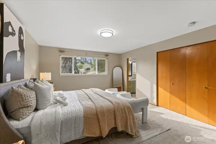 Primary bedroom with his & her closets. Main floor.