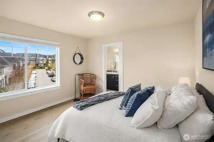 Second bedroom on the upper floor, also with it's own full private bathroom