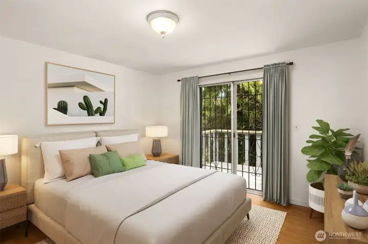 Second bedroom on upper level with entry to back upper deck. This photo is staged virtually.