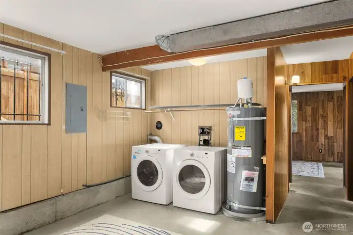 Full size side by side front loading washer and dryer. New hot water heater with expansion tank.