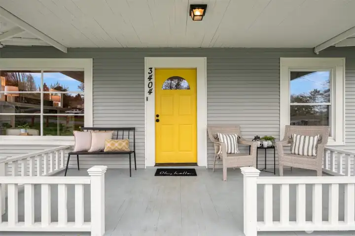 The covered front porch brings timeless character and everyday charm — the kind of inviting detail that makes this house feel instantly like home.