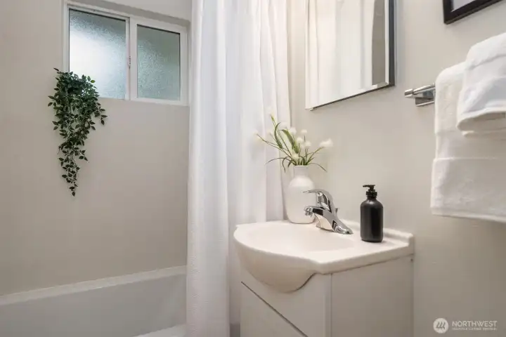 Clean, bright, and functional, the bath continues the home’s fresh, move-in-ready feel created by recent interior improvements.