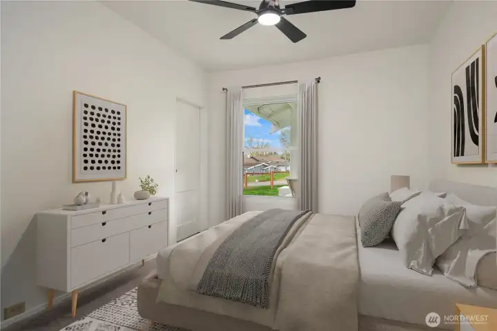 The 2nd bedroom is light-filled and versatile with fresh finishes, a new ceiling fan, and its own walk-in closet. This room is virtually staged.