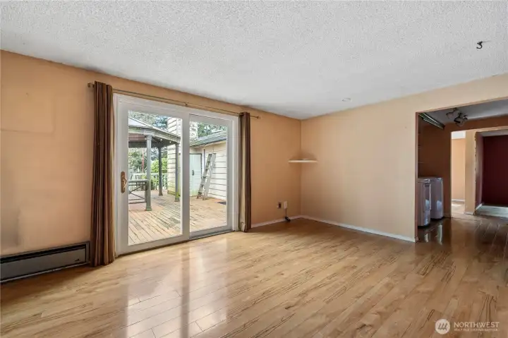 Great room with slider onto back deck.