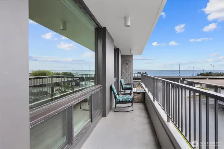 Ideal for outdoor dining, relaxing, or a personal garden escape with front-row seat to sailboats, sunsets, and coastal activity.