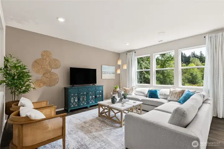 Great room concept! Spacious living area next to your kitchen and dining room. Pictures are for representation only colors and options will vary.