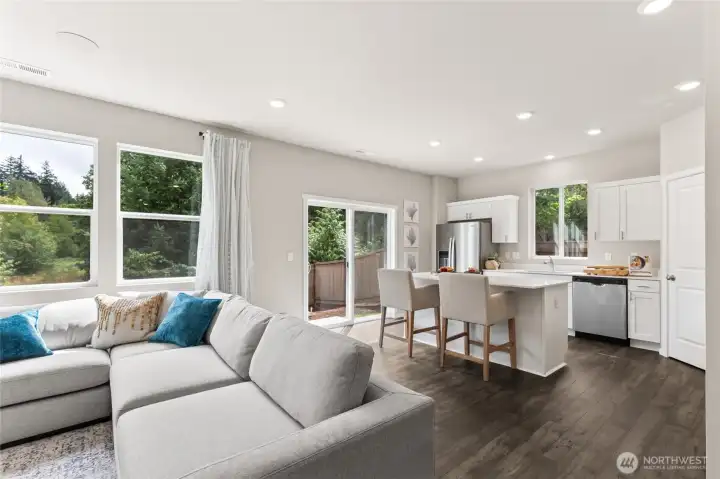 Many windows to bring in natural light. Pictures are for representation only colors and options will vary.