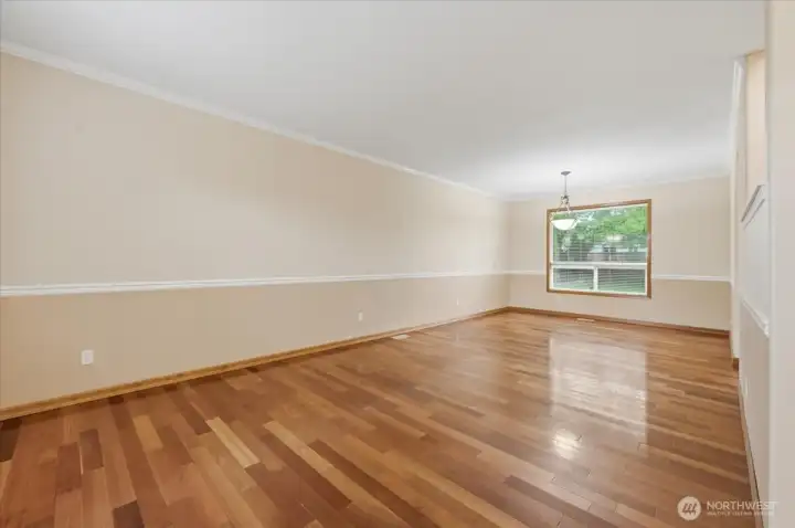 large formal living area with dining room