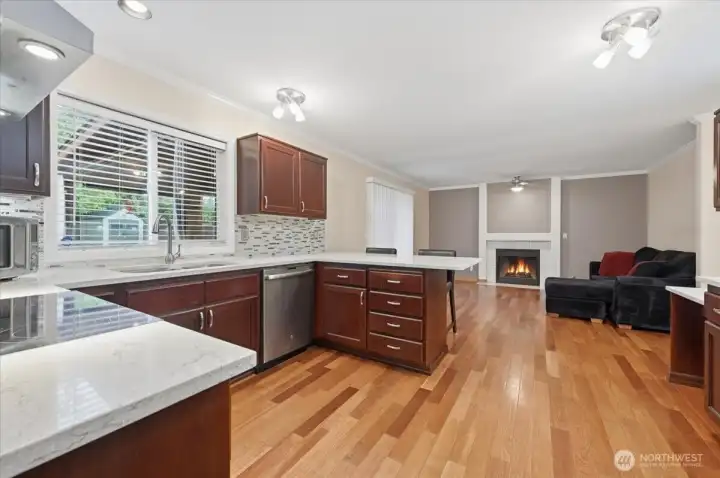 Kitchen with quartz countertops, tons of cabinets