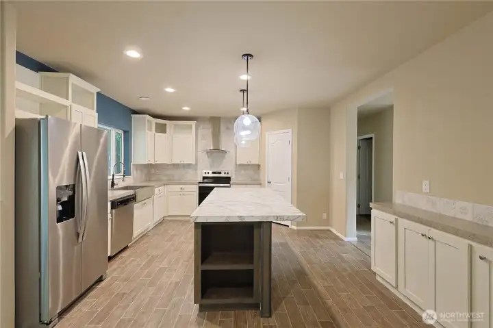 Kitchen w/SS appliances & ample storage
