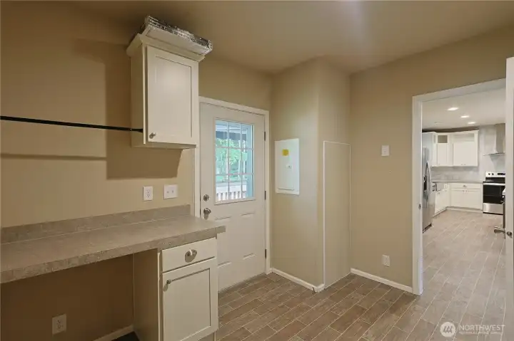 Large Laundry/Mud room w/separate deck entry