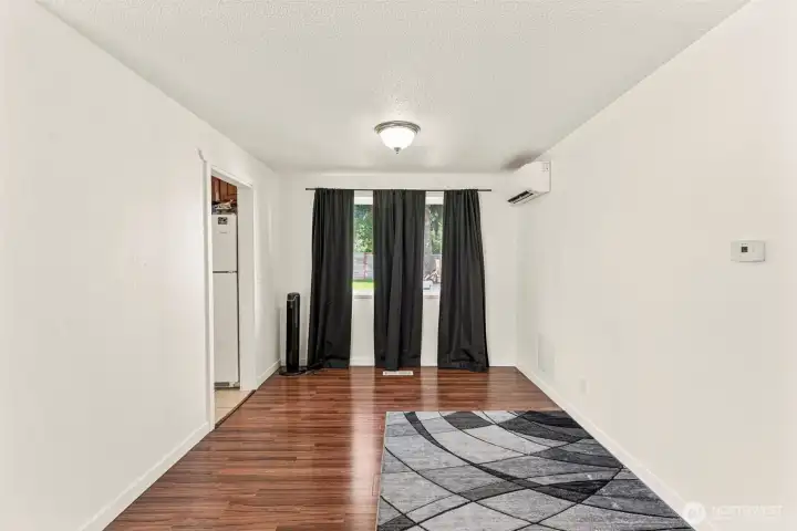 Sitting area, dining area, play space or office space.