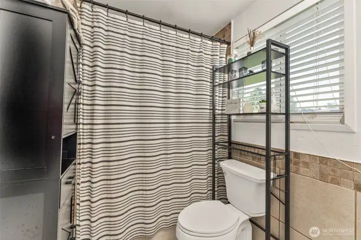 Bathroom off kitchen.