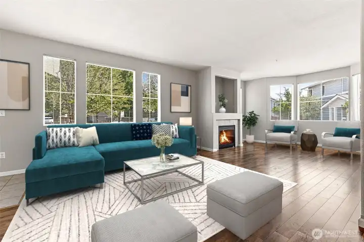 Open Concept Living / Dining / Kitchen with Natural Light, Gas Fireplace, and Hard-surface Flooring *virtually staged* Open Concept Living / Dining / Kitchen with Natural Light, Gas Fireplace, and Hard-surface Flooring *virtually staged*