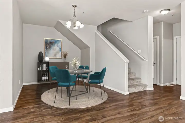 Open Concept Living / Dining / Kitchen with Natural Light, Gas Fireplace, and Hard-surface Flooring *virtually staged* Open Concept Living / Dining / Kitchen with Natural Light, Gas Fireplace, and Hard-surface Flooring *virtually staged*
