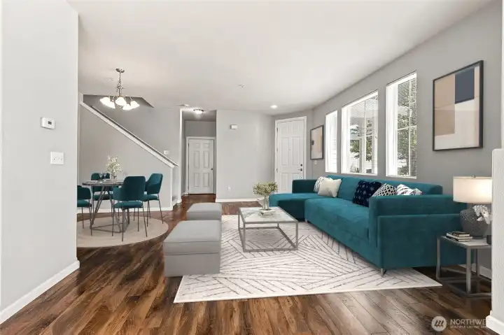 Open Concept Living / Dining / Kitchen with Natural Light, Gas Fireplace, and Hard-surface Flooring *virtually staged* Open Concept Living / Dining / Kitchen with Natural Light, Gas Fireplace, and Hard-surface Flooring *virtually staged*