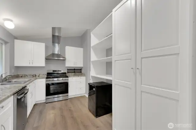 Kitchen features a gas range